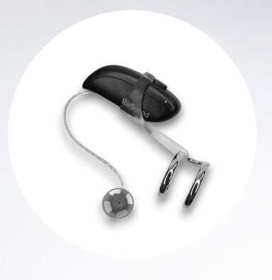 double cuff earring in silver is fitted to hearing aid